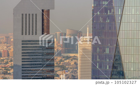 Dubai World Trade Centre on the Sheikh Zayed Road behind office towers in financial district aerial timelapse from above 105102327