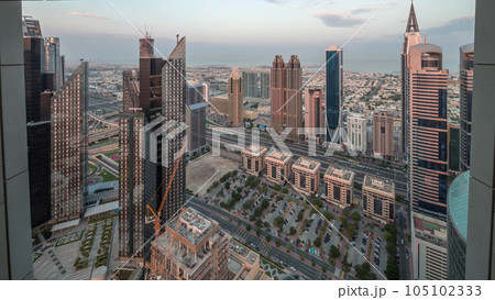 High-rise buildings on Sheikh Zayed Road in Dubai aerial morning timelapse, UAE. High-rise buildings on Sheikh Zayed Road in Dubai aerial morning timelapse, UAE. 105102333