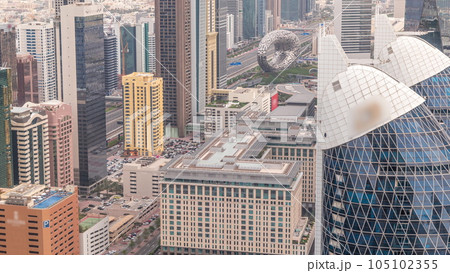Skyline looking down view of the high-rise buildings on Sheikh Zayed Road in Dubai aerial timelapse, UAE. 105102355