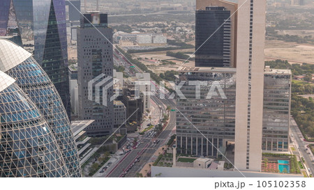 Skyline view of the high-rise buildings in International Financial district in Dubai aerial timelapse, UAE. 105102358