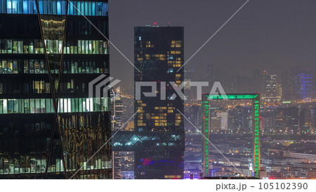 Bur Dubai and Deira districts aerial night timelapse viewed from financial district. 105102390