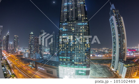 Panorama of business bay district skyline with modern architecture night timelapse from above. Panorama of business bay district skyline with modern architecture night timelapse from above. 105102469