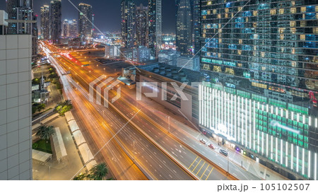 Business bay district skyline with modern architecture all night timelapse from above. Business bay district skyline with modern architecture all night timelapse from above. 105102507