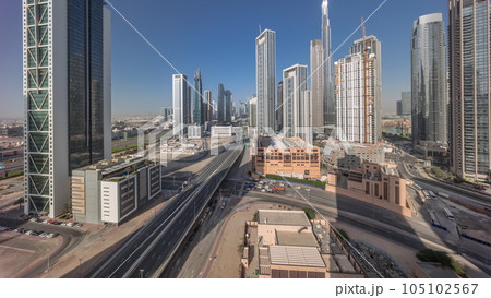 Aerial panoramic view of Dubai Downtown skyline with many towers timelapse. Aerial panoramic view of Dubai Downtown skyline with many towers timelapse. 105102567