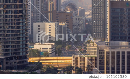 Dubai International Financial district aerial timelapse with road traffic 105102580