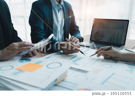 startup business, business advisor strategy for planning finance investment teamwork paperwork audit and discussing marketing, profit, budget of company in meeting room, stock market chart concepts 105110355