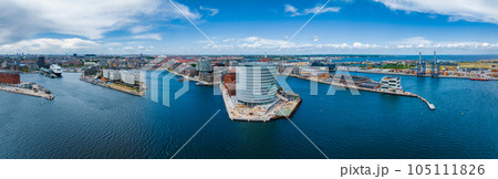 Aerial panorama of Indre Osterbro, Nordhavnen districts. New modern district in Copenhagen, Denmark. Beautiful modern buildings, Portland Towers and UN. Aerial panorama of Indre Osterbro, Nordhavnen districts. New modern district in Copenhagen, Denmark. Beautiful modern buildings, Portland Towers and UN. 105111826