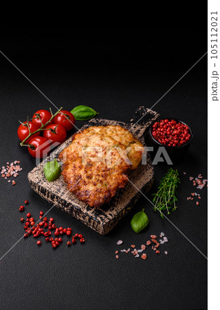 Delicious fresh fried minced chicken meat cutlets with salt, spices and herbs 105112021