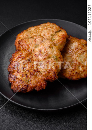 Delicious fresh fried minced chicken meat cutlets with salt, spices and herbs Delicious fresh fried minced chicken meat cutlets with salt, spices and herbs 105112028