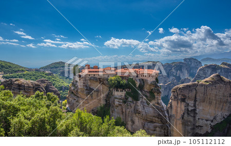 Greece. Meteora - incredible sandstone rock formations and monasteries. The Meteora area is on UNESCO World Heritage List. summer panorama Greece. Meteora - incredible sandstone rock formations and monasteries. The Meteora area is on UNESCO World Heritage List. summer panorama 105112112
