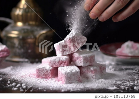 dusting cooled turkish delight with powdered sugar, created with generative ai 105113769