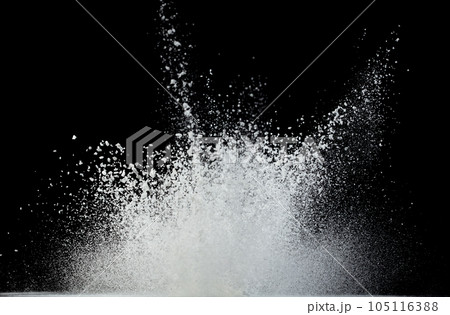 Tapioca starch flour fly explosion, White powder tapioca starch fall down in air. Seasoning flour powder is element material. Eyeshadow crush make up. Black background Isolated selective focus blur 105116388