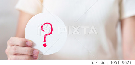 Woman show Questions Mark ( ? ) on paper. FAQ, frequency asked questions, Answer, Q and A, Information, Communication and interrogation Concepts 105119623
