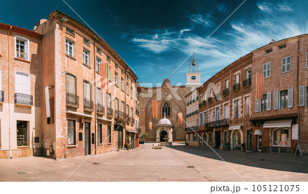 Perpignan, France. Leon Gambetta Square And Cathedral Basilica Of Saint John The Baptist Of Perpignan In Sunny Summer Day Perpignan, France. Leon Gambetta Square And Cathedral Basilica Of Saint John The Baptist Of Perpignan In Sunny Summer Day 105121075