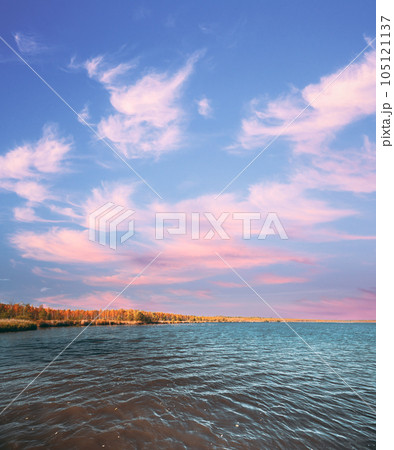 Belarus. Autumn Landscape With Lake Pond River And Beautiful Birch Forest On Another Riverside. Trees Woods With Yellow And Oranges Colours Foliage In Sunny Day In Autumn Season Belarus. Autumn Landscape With Lake Pond River And Beautiful Birch Forest On Another Riverside. Trees Woods With Yellow And Oranges Colours Foliage In Sunny Day In Autumn Season 105121137