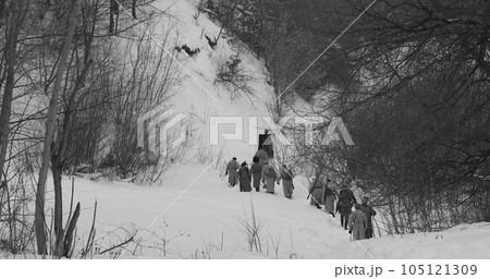 Men Dressed As White Guard Soldiers Of Imperial Russian Army In Russian Civil War s Marching Through Snowy Winter Forest. Historical Reenactment of Civil War. Army on Marching. Black And White Video 105121309