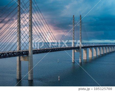 Panoramic aerial close up view of Oresund bridge over the Baltic sea between Malmo city in Sweden and Copenhagen in Denmark. 105125700