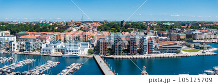 View of the Helsinborg city centre and the port of Helsingborg in Sweden. Old town by the beach and city port in Helsingborg harbour. Beautiful aerial view. 105125709
