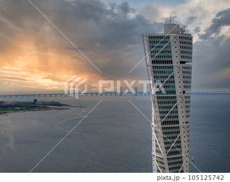 Beautiful aerial panoramic view of the Malmo city in Sweden. Turning Torso skyscraper in Malmo, Sweden. Beautiful aerial panoramic view of the Malmo city in Sweden. Turning Torso skyscraper in Malmo, Sweden. 105125742