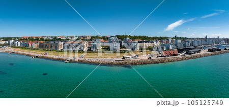 View of the Helsinborg city centre and the port of Helsingborg in Sweden. Old town by the beach and city port in Helsingborg harbour. Beautiful aerial view. 105125749