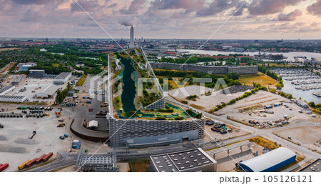 Amager Bakke, Amager Hill or Amager Slope or Copenhill - a heat and power waste-to-energy plant and a sports park in Amager, Copenhagen, Denmark. ESG green energy. Amager Bakke, Amager Hill or Amager Slope or Copenhill - a heat and power waste-to-energy plant and a sports park in Amager, Copenhagen, Denmark. ESG green energy. 105126121