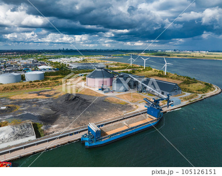 Coal factory in Copenhagen, Denmark. Ships bringing coal to the electrical power plant. 105126151
