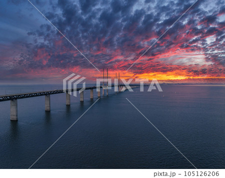 Panoramic aerial close up view of Oresund bridge over the Baltic sea between Malmo city in Sweden and Copenhagen in Denmark. 105126206