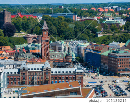 View of the Helsinborg city centre and the port of Helsingborg in Sweden. Old town by the beach and city port in Helsingborg harbour. Beautiful aerial view. 105126215
