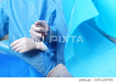 Surgery on blood vessels. Endovascular surgery. Removal of blood clots. Surgical interventions on blood vessels. The concept of healthcare. 105126766