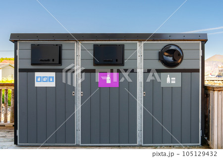 Recycling Garbage Bins Waste Sorting Concept Garbage collector on the street Waste sorting container 105129432