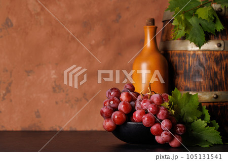 Wine bottle and grapes Wine bottle and grapes 105131541