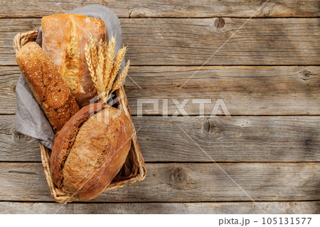 Assorted bread varieties in a basket Assorted bread varieties in a basket 105131577