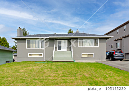 Average residential house with landscaped front yard in Canada Average residential house with landscaped front yard in Canada 105135220