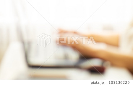 Blurred female hands typing on keyboard laptop computer. Business, education and programming concept 105136229