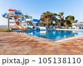 Empty small aquapark sliders with pool and palm trees at the morning, Tunisia 105138110