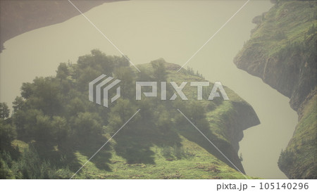 An aerial view of tropical rainforest in the morning misty 105140296