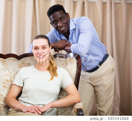 Portrait of positive couple at home 105141888