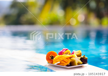 Tropical fruit at swimming pool Tropical fruit at swimming pool 105143917