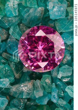 amethyst diamonds diamond on placed on a pile of raw sky blue gemstones..jewelry are lovely present for valentine day.colorful raw stone background.lived a life of luxury. amethyst diamonds diamond on placed on a pile of raw sky blue gemstones..jewelry are lovely present for valentine day.colorful raw stone background.lived a life of luxury. 105145971