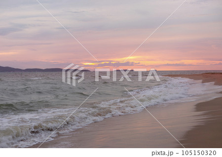 Raging Sea on the Pink Sunset Sky Background Raging Sea on the Pink Sunset Sky Background 105150320