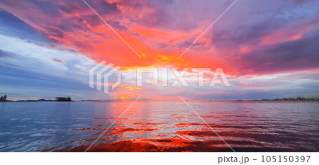sunset over water Phuket thailand 105150397
