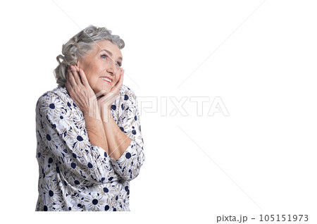 happy senior woman posing isolated on white background happy senior woman posing isolated on white background 105151973