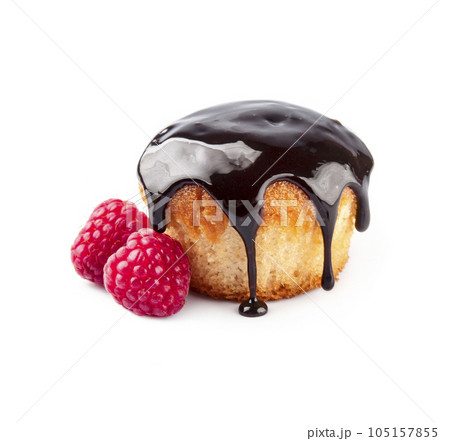 Cupcake with chocolate topping with raspberry on white backgrounds 105157855