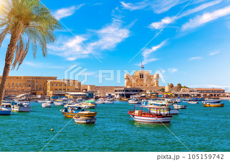 Alexandria harbour, boats near Qaitbay fort, point of the famous lighthouse, Egypt Alexandria harbour, boats near Qaitbay fort, point of the famous lighthouse, Egypt 105159742