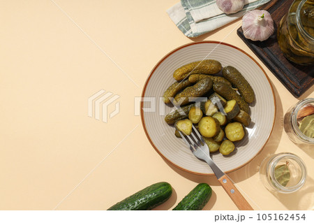 Tasty canned food concept, canned cucumbers, food for winter Tasty canned food concept, canned cucumbers, food for winter 105162454