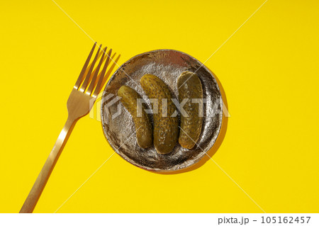 Tasty canned food concept, canned cucumbers, food for winter Tasty canned food concept, canned cucumbers, food for winter 105162457