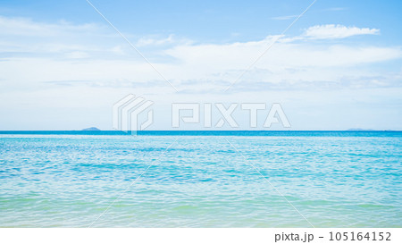 Blue Sea Shore Summer with Blue Sky Background,Cloud white Ocean Seascape,Water Wave,Beautiful Nature Coast Island,for Tourism Travel Vacation Tropical Holidays Concept. 105164152