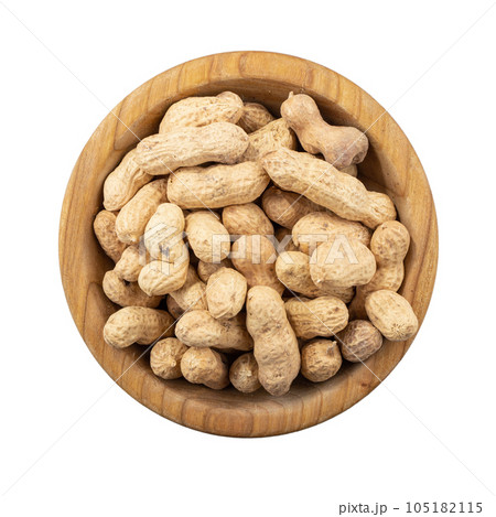 Unshelled peanuts in a bowl isolated on the white background. File contains clipping path. 105182115
