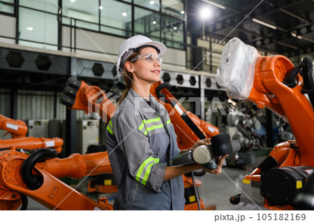 Maintenance engineer worker working with robotic machine automation Maintenance engineer worker working with robotic machine automation 105182169