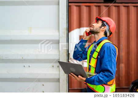 Warehouse engineer worker checking and working at industrial container station 105183426